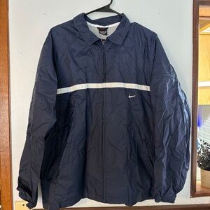 Nike Men's Dark Blue Windbreaker with White Stripe